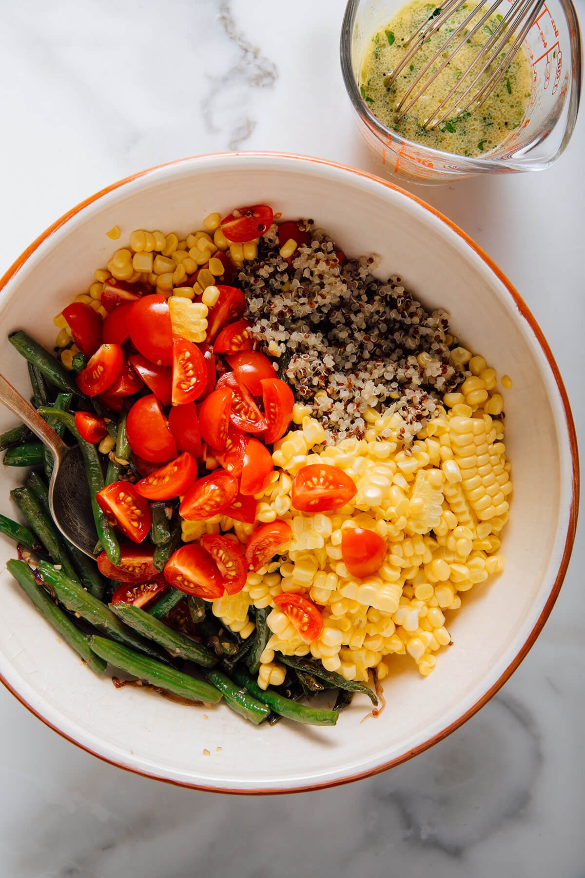 quinoa salad with blistered green beans, corn and tomatoes