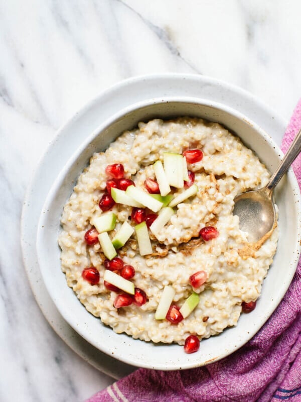 Ultra creamy, toasted steel-cut oats. Learn how to cook a batch that lasts all week! cookieandkate.com