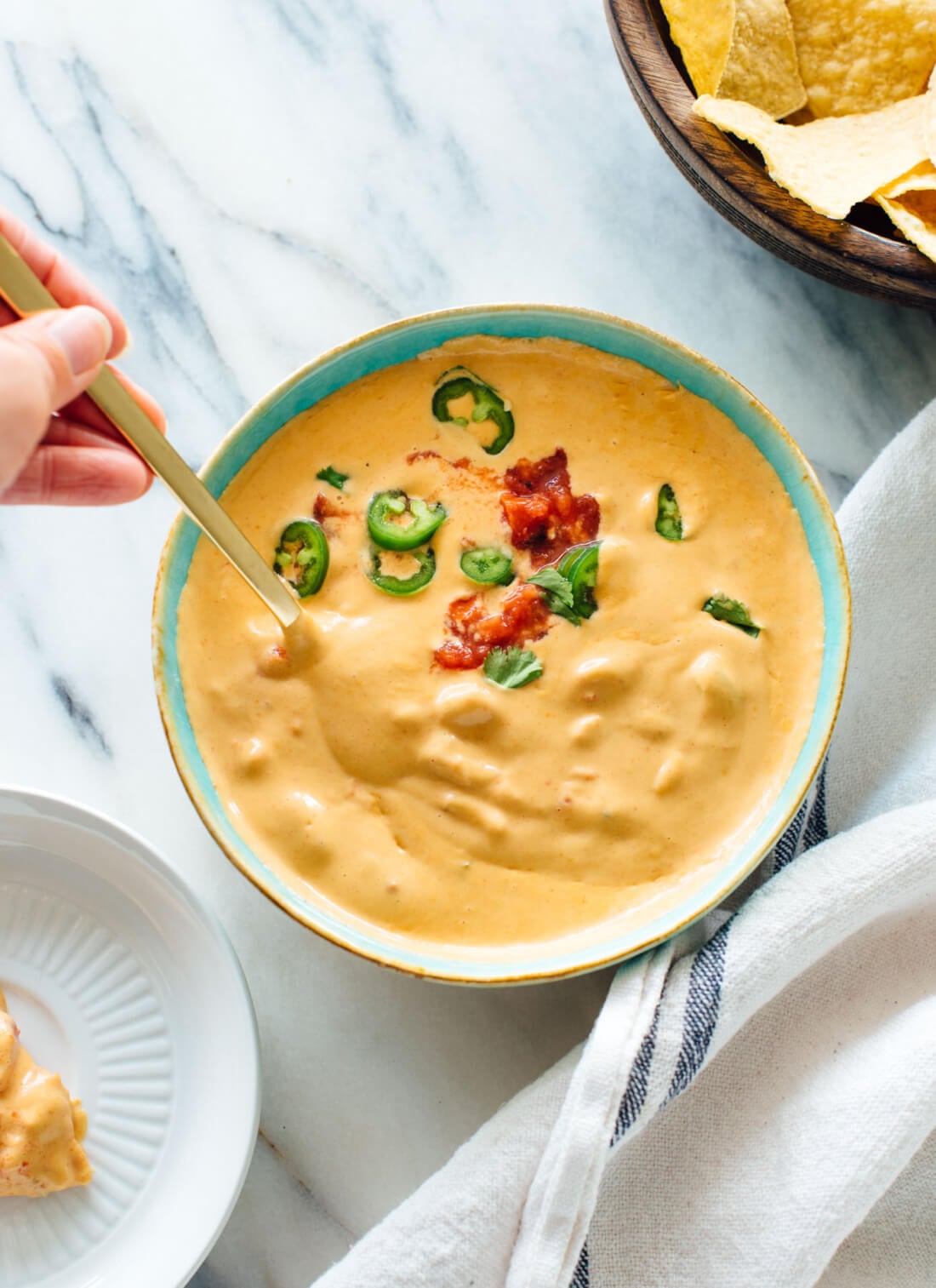 Amazing healthy queso recipe - this queso dip is as satisfying as the regular cheesy kind! cookieandkate.com
